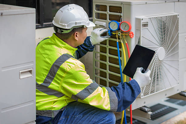 Professional Hvac technician working in Mansfield Center, CT